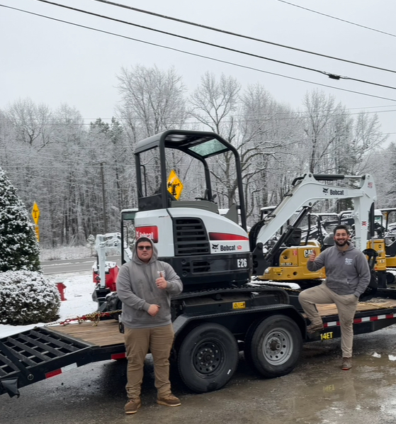 Southern Style Turf crew with equipment on a snowy day, Lake Norman area